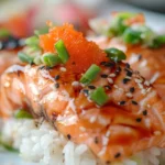 Delicious Salmon and Rice Recipes :You Need to Try 9 Close-up of salmon nigiri sushi with toppings.