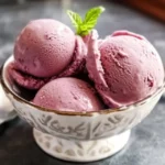 Plum Recipes Ice Cream: Irresistible Desserts to Try 9 Plum ice cream in a white bowl.